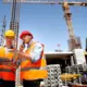 Structural Engineer And Architect Dressed in Orange Work